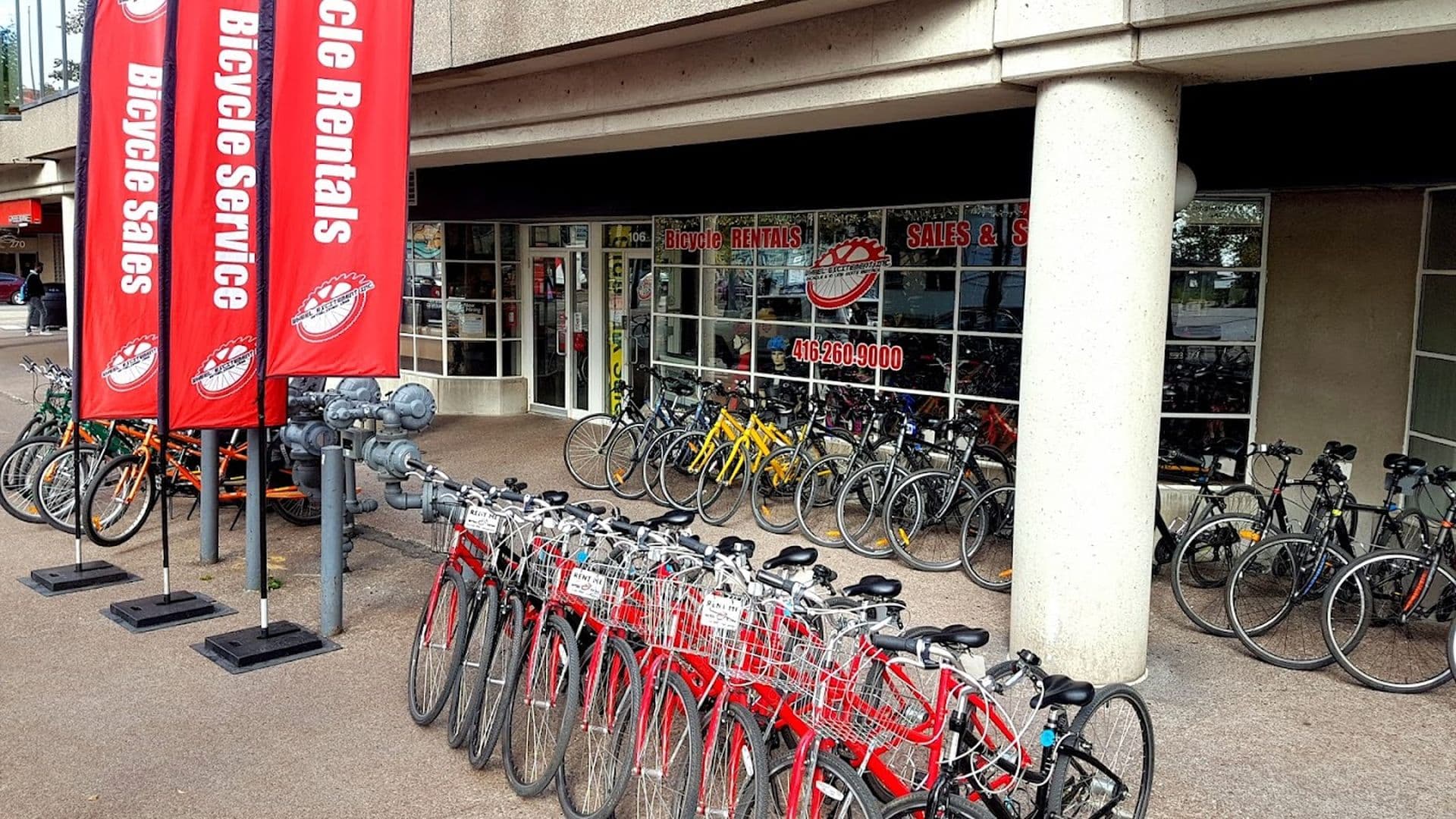 Pictures of rental bikes and storefront in Toronto