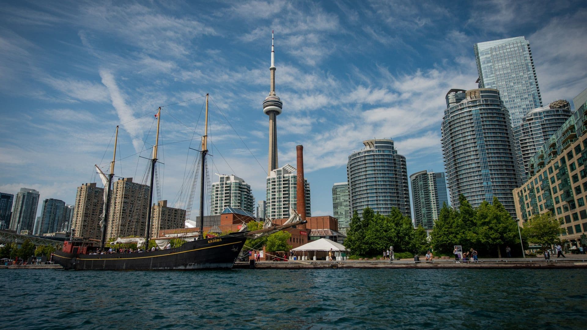 Toronto Boat Tours Tall Ship Kajama in front of the CN tower