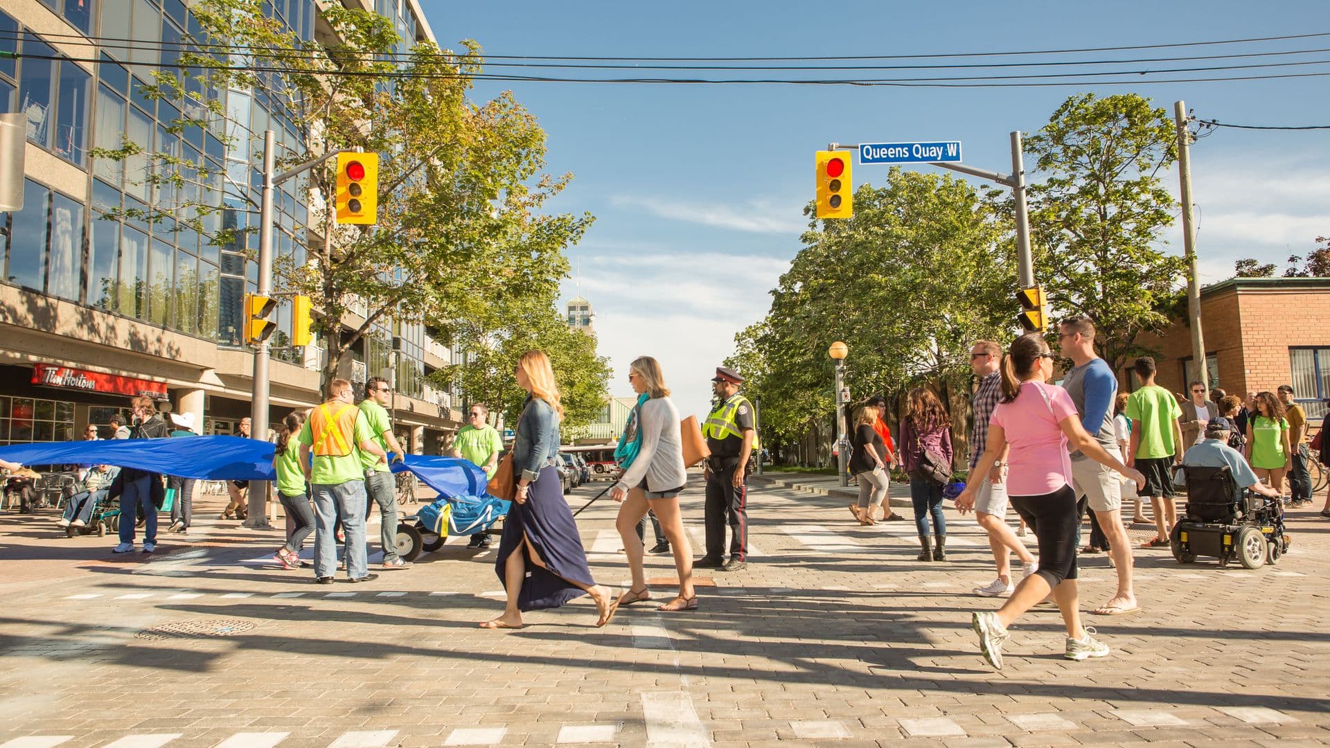 Pedestrians walking on Queens Quay
